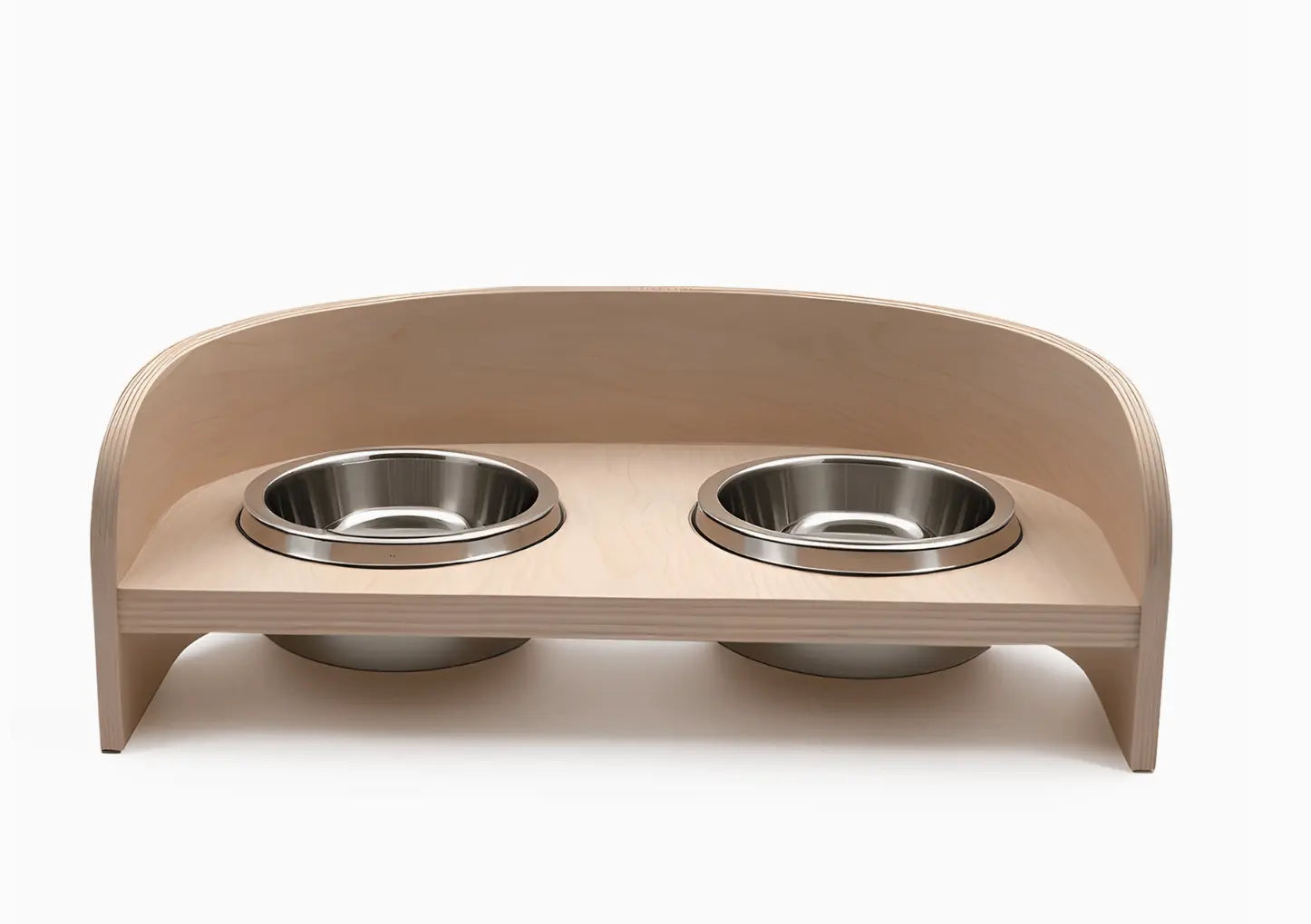 Modern Wooden Pet Bowl Stand with Stainless Steel Bowls Crafted with natural plywood, this modern feeding station brings the warmth of wood into your home while maintaining a sleek, contemporary aesthetic that seamlessly integrates with your décor. Key Fe