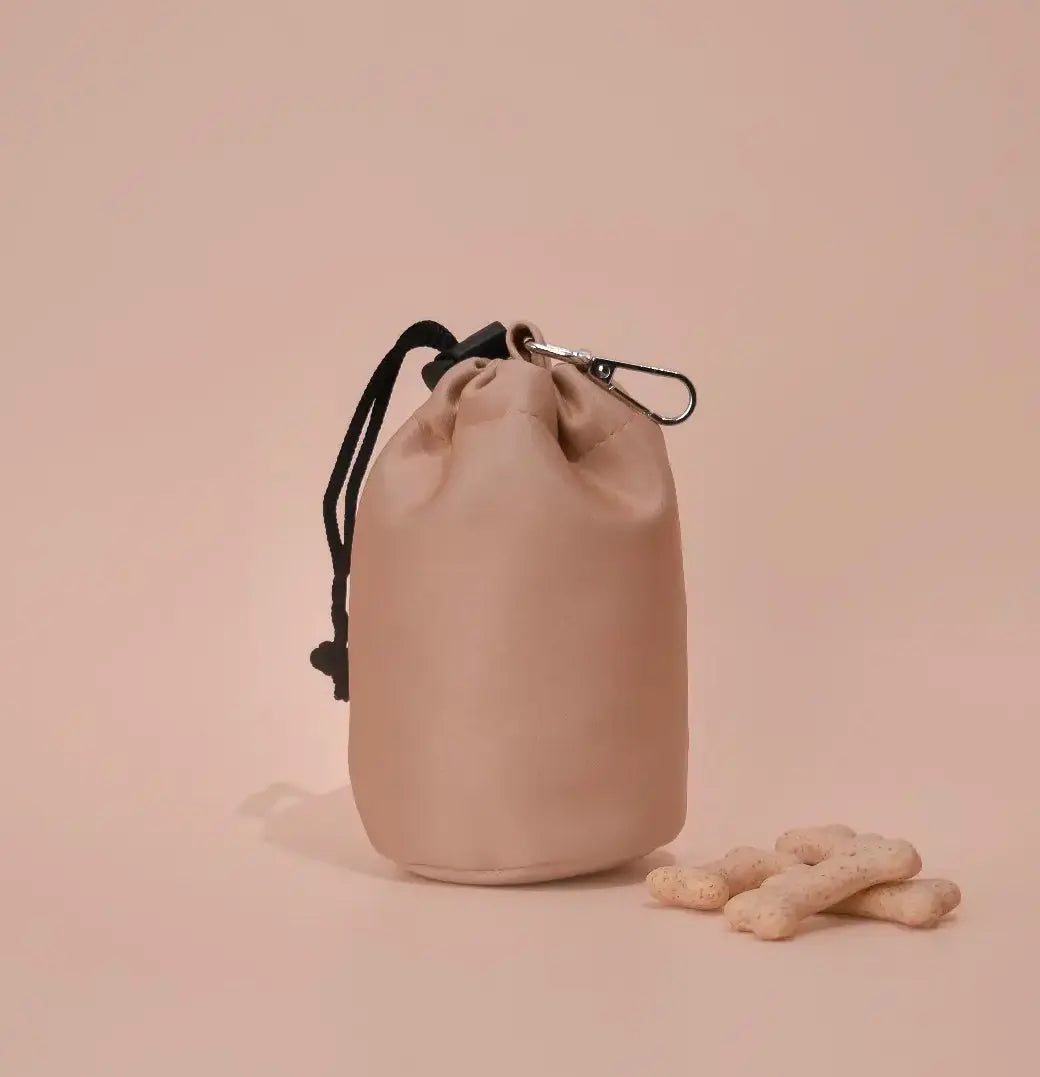 stylish tan leather dog or cat treat pouch. Comes with a clip to attach to any leash or bag